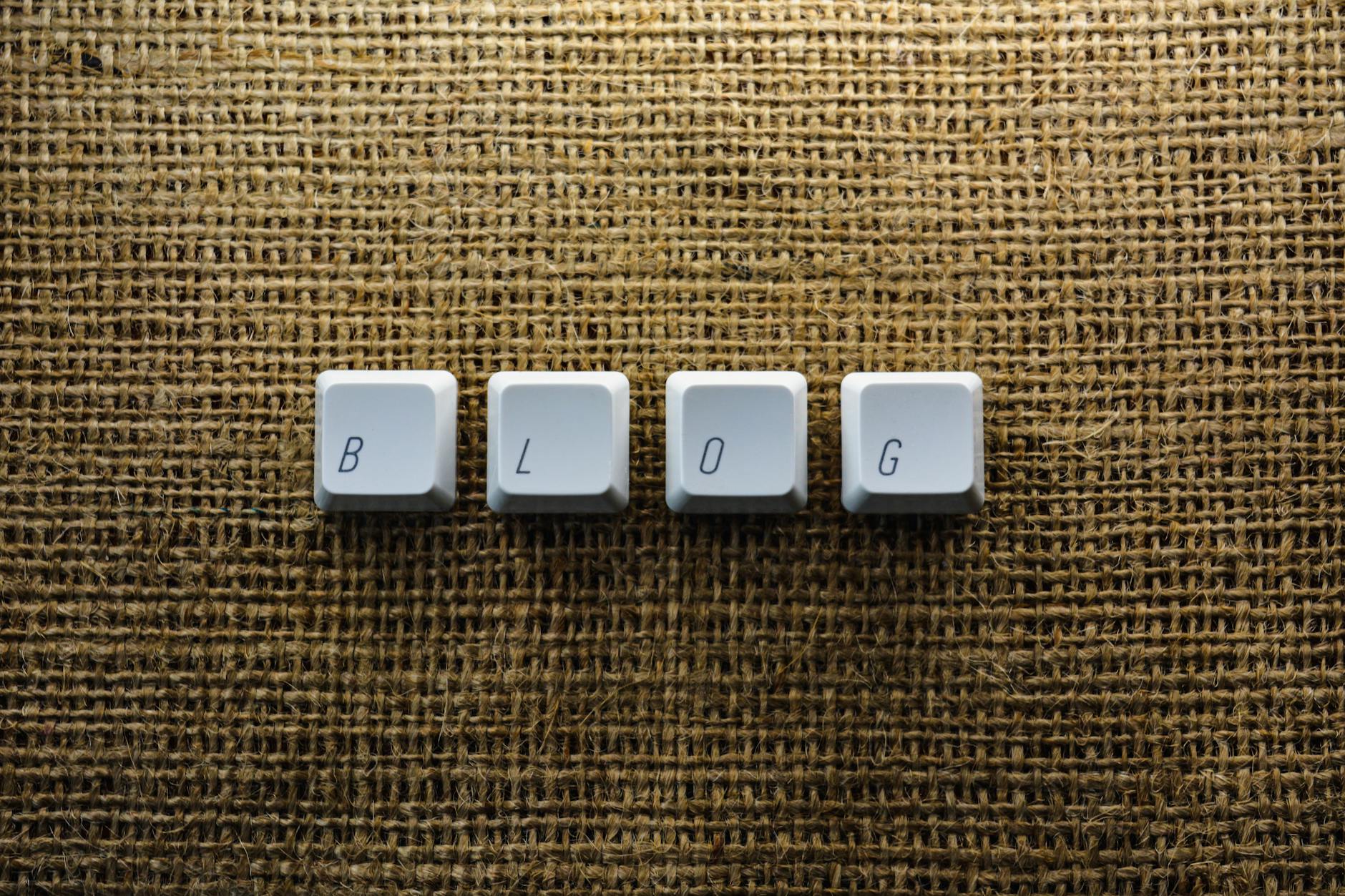 close up of individual keyboard keys making a word blog